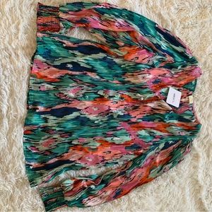 Brand new button up fun top never worn